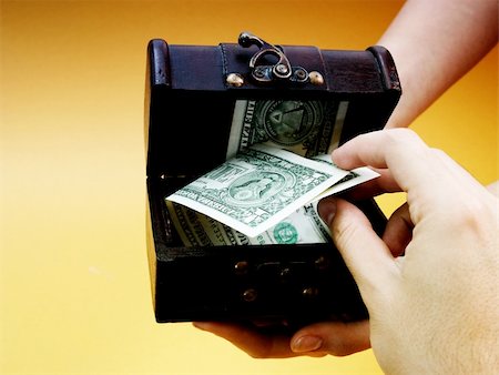 simsearch:400-07774250,k - Wood cashbox isolated on yellow Stock Photo - Budget Royalty-Free & Subscription, Code: 400-05252660