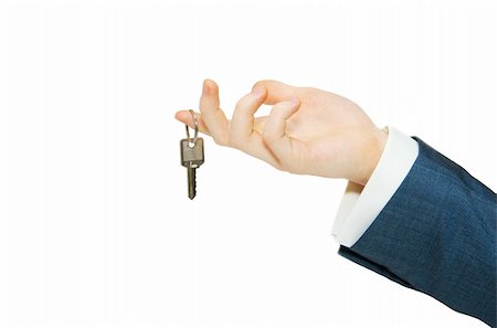 simsearch:400-05361671,k - hand holds a key isolated on white Stock Photo - Budget Royalty-Free & Subscription, Code: 400-05252869
