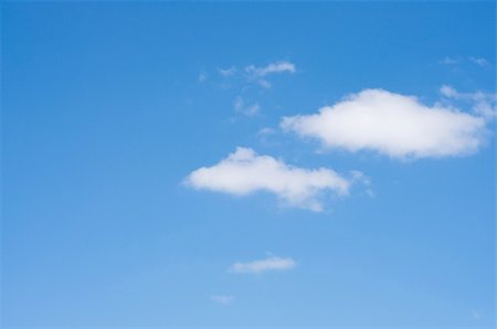 Blue sky with white small clouds. Stockbilder - Microstock & Abonnement, Bildnummer: 400-05253102