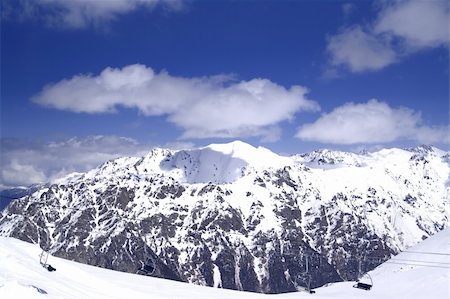 simsearch:400-07902631,k - Chair-lift at ski resort. Caucasus Mountains,  Dombay. Photographie de stock - Aubaine LD & Abonnement, Code: 400-05253750