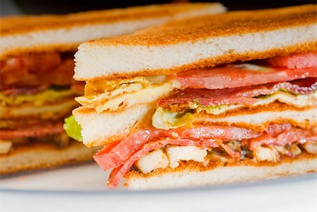 simsearch:400-04798472,k - fresh and delicious classic club sandwich over a transparent glass dish Stock Photo - Budget Royalty-Free & Subscription, Code: 400-05264062