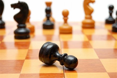 simsearch:400-04955785,k - Black pawn is killed on chess war Stock Photo - Budget Royalty-Free & Subscription, Code: 400-05264526