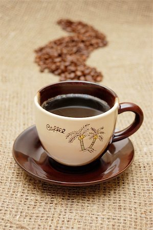 simsearch:400-04604628,k - Coffee cup and beans in shape of steam on hessian canvas Stockbilder - Microstock & Abonnement, Bildnummer: 400-05264541