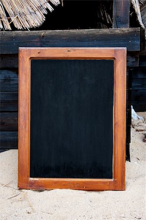 simsearch:400-08998170,k - Black board on the bach in the sand Foto de stock - Super Valor sin royalties y Suscripción, Código: 400-05264928