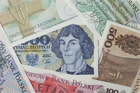 Copernicus (astronomer)  portrait on a vintage Polish banknote framed by other banknotes from the same edition Stockbilder - Microstock & Abonnement, Bildnummer: 400-05265268