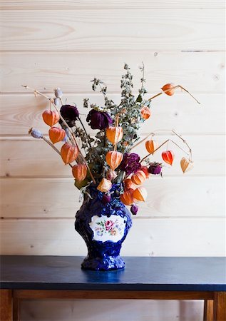 Still-life with dry flowers and grasses in a dark blue vase Stock Photo - Budget Royalty-Free & Subscription, Code: 400-05265293