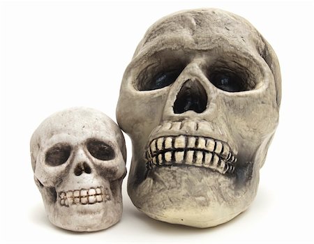 Large and small joke skulls for Halloween or Day of the Dead on white background Foto de stock - Super Valor sin royalties y Suscripción, Código: 400-05265322