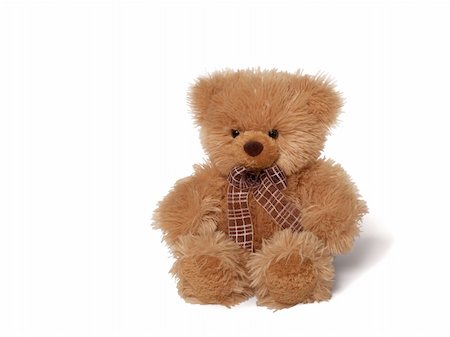 furry teddy bear - Isolated teddy bear sitting at white background. Soft children toy Stock Photo - Budget Royalty-Free & Subscription, Code: 400-05265650