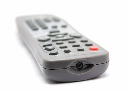 simsearch:400-05223721,k - TV remote control. Selective focus limited to front objects. Foto de stock - Royalty-Free Super Valor e Assinatura, Número: 400-05267171