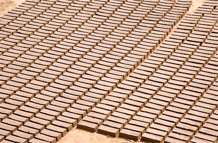 Traditional brick factory; bricks drying in the sun in Lombok, Indonesia Stock Photo - Budget Royalty-Free & Subscription, Code: 400-05267434