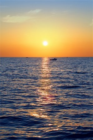 blue golden sunrise seascape sea ocean red golden colorful Stock Photo - Budget Royalty-Free & Subscription, Code: 400-05267526