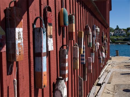 bouys on red painted barn in rockport massachusetts Stock Photo - Budget Royalty-Free & Subscription, Code: 400-05267667