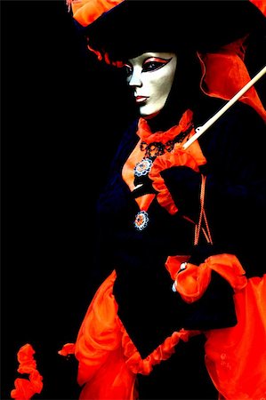 A masked woman on black background, at the Venice Carnival Foto de stock - Super Valor sin royalties y Suscripción, Código: 400-05267995