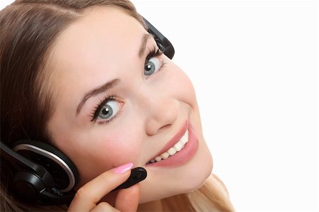 simsearch:400-04801703,k - Pretty caucasian woman with headset smiling during a telephone conversation. Foto de stock - Super Valor sin royalties y Suscripción, Código: 400-05268330