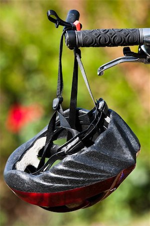 red bicycle nobody - red helmet hanging from handlebars Stock Photo - Budget Royalty-Free & Subscription, Code: 400-05268389