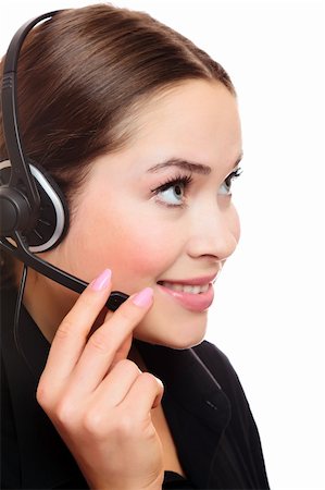 simsearch:400-04801703,k - Pretty caucasian woman with headset smiling during a telephone conversation. Foto de stock - Super Valor sin royalties y Suscripción, Código: 400-05268431