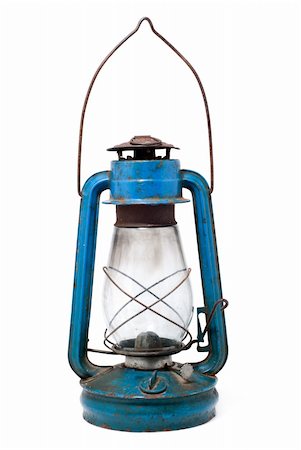 Old rusty blue  kerosene lamp isolated on white background Fotografie stock - Microstock e Abbonamento, Codice: 400-05268577