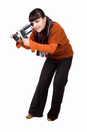 young adult woman with retro camera. over white background Stock Photo - Budget Royalty-Free & Subscription, Code: 400-05268813