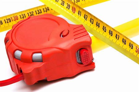 simsearch:400-04923680,k - Red new tape-measure on a white background Stock Photo - Budget Royalty-Free & Subscription, Code: 400-05268846