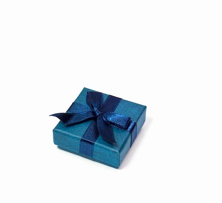 a blue gift box on white background Photographie de stock - Aubaine LD & Abonnement, Code: 400-05268863