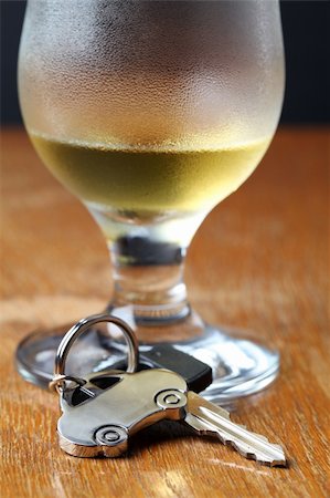 simsearch:400-04947548,k - Car key with car-shaped pendant and a glass of beer Stock Photo - Budget Royalty-Free & Subscription, Code: 400-05268968