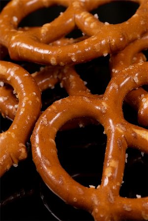 pretzel stick - Closeup take  of some salted crunchy pretzels Foto de stock - Super Valor sin royalties y Suscripción, Código: 400-05269573