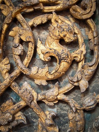 detail of Dragon carved on wooden door Stock Photo - Budget Royalty-Free & Subscription, Code: 400-05269888