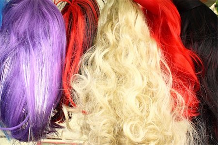 Colorful wigs for camouflage for carnival in a retail store on the street Stock Photo - Budget Royalty-Free & Subscription, Code: 400-05269956