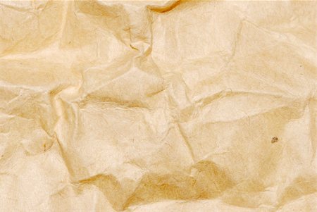 sheet of paper wrinkled - brown fold paper texture background Stock Photo - Budget Royalty-Free & Subscription, Code: 400-05260108