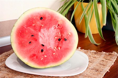 simsearch:859-03600261,k - A slice of juicy water melon . Stock Photo - Budget Royalty-Free & Subscription, Code: 400-05261131