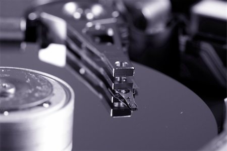 simsearch:400-03992953,k - Macro photo - Hard Disk Drive. Great details ! Stock Photo - Budget Royalty-Free & Subscription, Code: 400-05261188