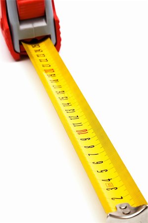 simsearch:400-04923680,k - Red new tape-measure on a white background Stock Photo - Budget Royalty-Free & Subscription, Code: 400-05261336