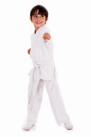 simsearch:400-04222731,k - Small karate boy in training isolated white background Photographie de stock - Aubaine LD & Abonnement, Code: 400-05261542