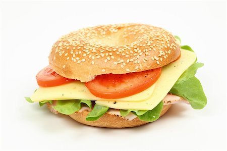 sesame bagel - Fresh bagel sandwich over white background Foto de stock - Super Valor sin royalties y Suscripción, Código: 400-05261584