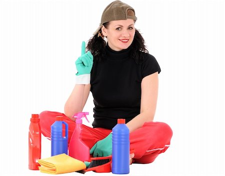 The woman sits about bottles with a washing-up liquid isolated on white background Stockbilder - Microstock & Abonnement, Bildnummer: 400-05262069