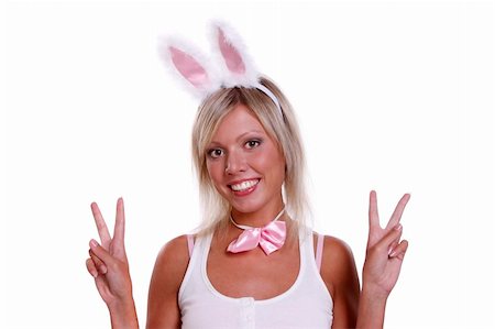 Woman wearing fancy dress on Halloween. A young female dressed up as rabbit Cute girl in sexy playboy costume on white backgrounds. Foto de stock - Super Valor sin royalties y Suscripción, Código: 400-05262075