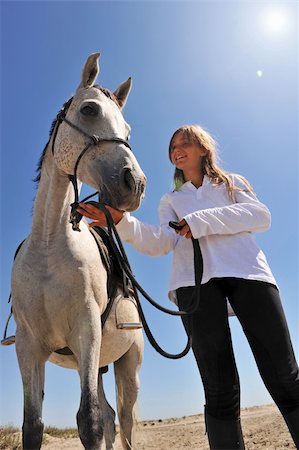 simsearch:400-04660370,k - smiling young teen and her gray arabian horse on the beach Photographie de stock - Aubaine LD & Abonnement, Code: 400-05262151