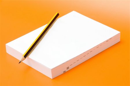 simsearch:400-04085316,k - blank book and pencil over an orange background Stock Photo - Budget Royalty-Free & Subscription, Code: 400-05262186