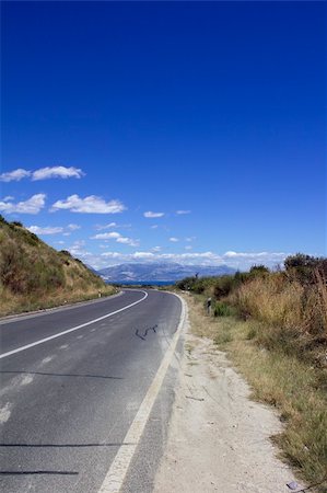 simsearch:400-08071939,k - turning road with mountains in the background Stock Photo - Budget Royalty-Free & Subscription, Code: 400-05262215