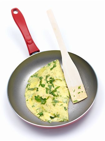 A freshley cooked herb omelette in a frying pan Stock Photo - Budget Royalty-Free & Subscription, Code: 400-05262318