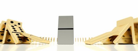 picture falling dominoes - The close plan of golden dominoes bones in action of starting of the dominoes effect which was shoot on a wide-angle lens Stock Photo - Budget Royalty-Free & Subscription, Code: 400-05262570