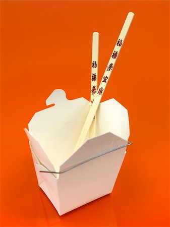 A Chinese takeaway container isolated against an orange background Stock Photo - Budget Royalty-Free & Subscription, Code: 400-05262820