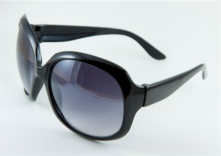 Trendy black sunglasses isolated on white background Photographie de stock - Aubaine LD & Abonnement, Code: 400-05262947
