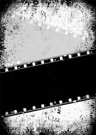 simsearch:400-05102933,k - Closeup of old 35 mm movie Film reel Fotografie stock - Microstock e Abbonamento, Codice: 400-05263992
