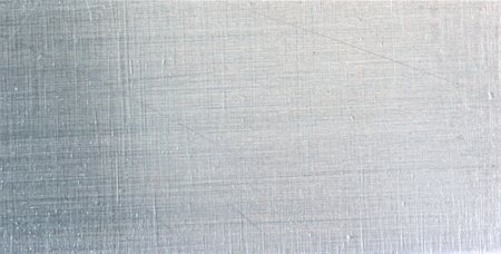 danicek (artist) - Detail view of silver scratched metal surface Foto de stock - Super Valor sin royalties y Suscripción, Código: 400-05274423