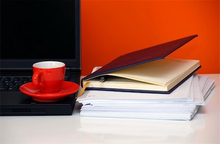 pause button - red cup over black notebook on office desk still life Stock Photo - Budget Royalty-Free & Subscription, Code: 400-05274447