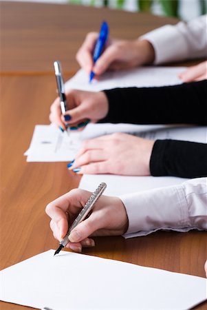 person's hand signing an important document in office Stock Photo - Budget Royalty-Free & Subscription, Code: 400-05275474