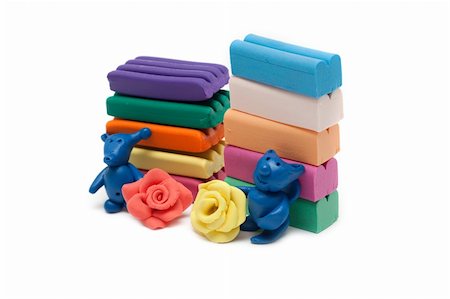 Plasticine of the toy and plates, varicoloured homemade articles Stock Photo - Budget Royalty-Free & Subscription, Code: 400-05275642