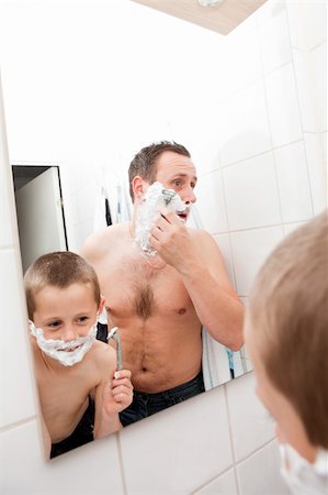 father and son and shave - Happy Mature Man shaving in bathroom with his son Stock Photo - Budget Royalty-Free & Subscription, Code: 400-05276117