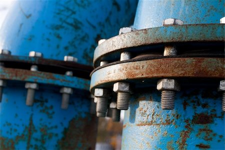 pipeline engineer - Industrial blue pipelines joint with bolts and joints Stock Photo - Budget Royalty-Free & Subscription, Code: 400-05276119